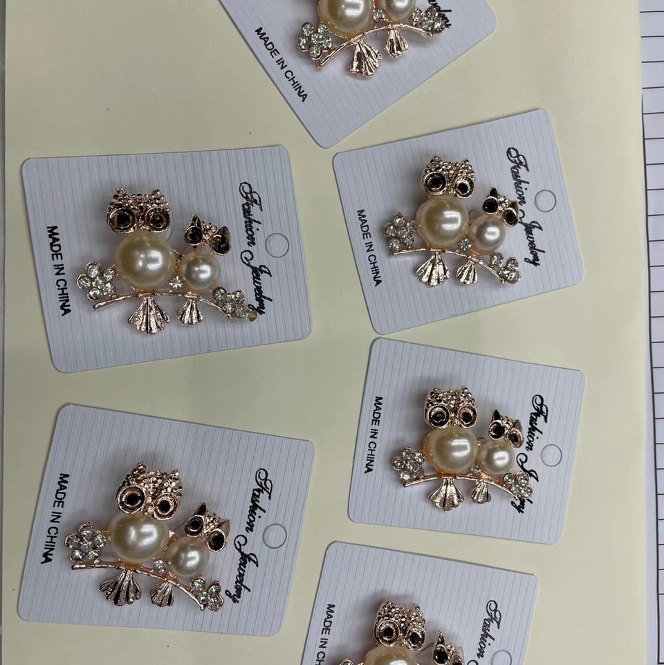 Owl brooch