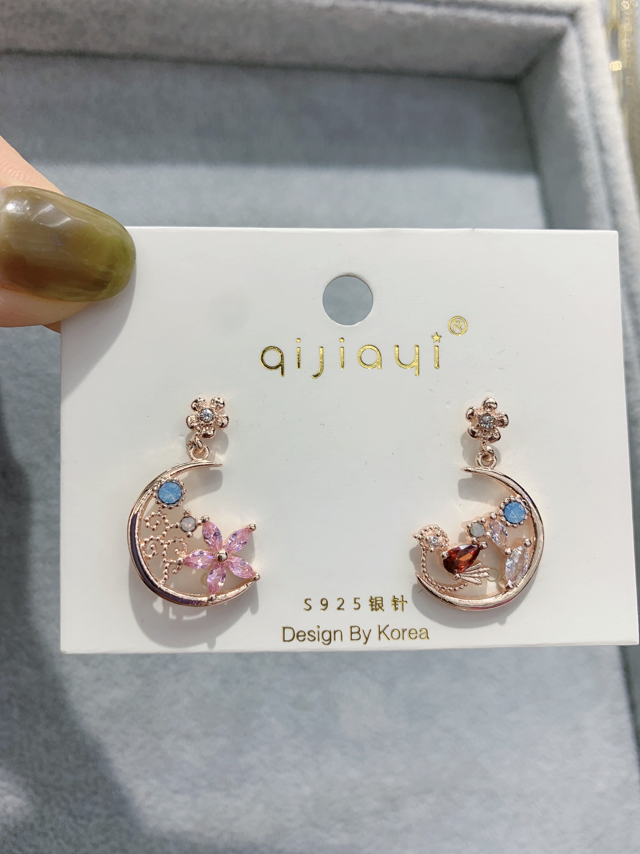 Dongdaemun, South Korea, micro-inlaid zircon flower bird cute and fresh asymmetrical moon S925 silver needle earrings Application Scenario