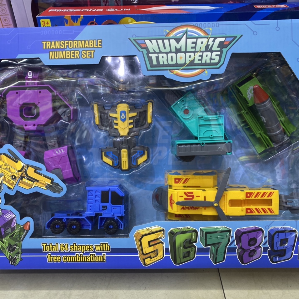 The box contains manual educational toys