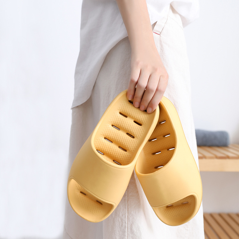 EVA non-slip soft bottom water leakage platform slippers bath male and female couples home slippers hollow-out slippers bathroom slippers