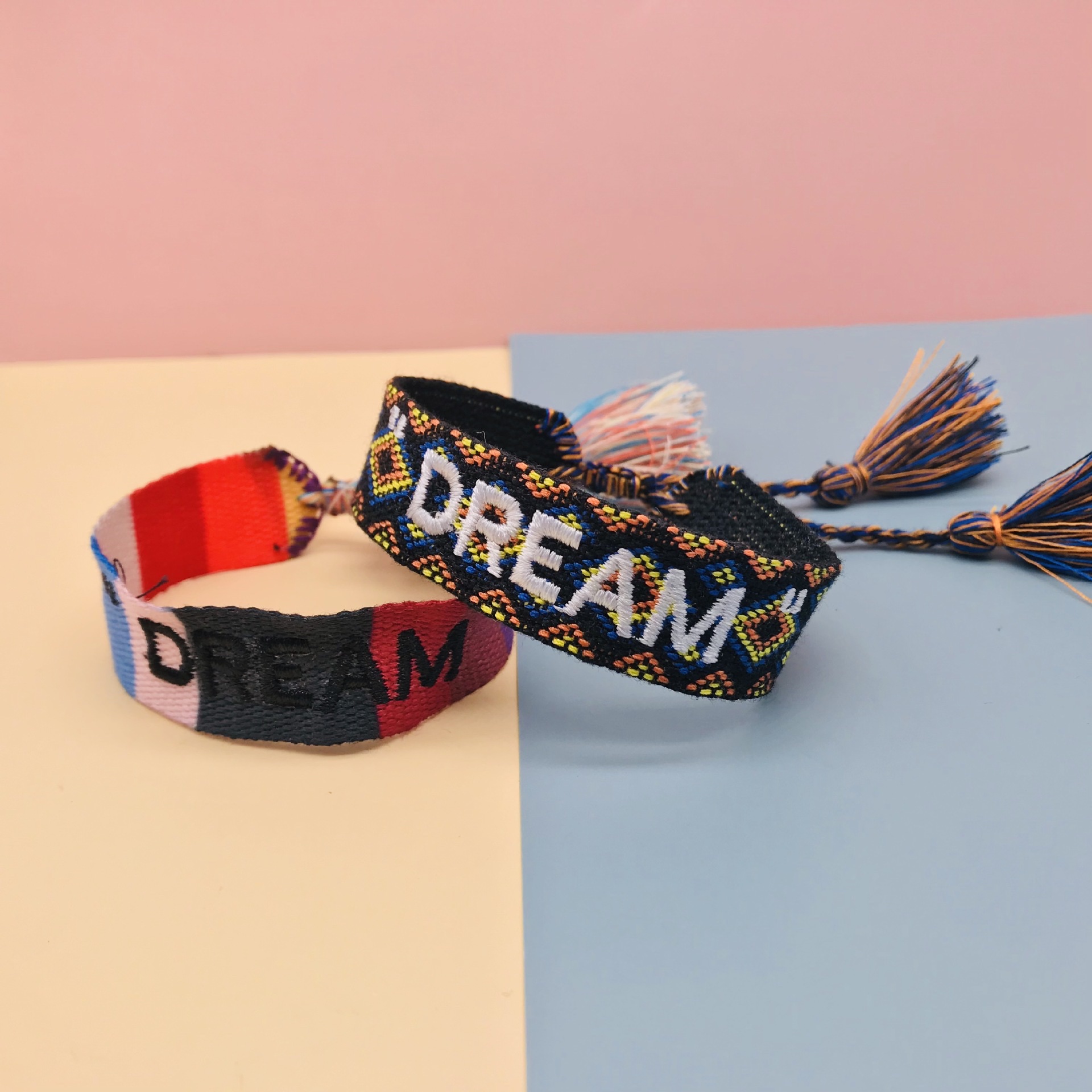 Factory direct sales of popular European and American accessories, simple and fashionable ethnic style wristbands, handcrafted tassel letter woven wristbands detail image 1