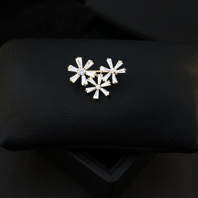 Three flower pins