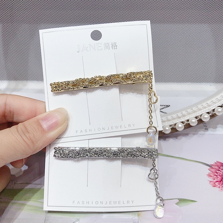 时尚特色百搭保色金银色藤条形状拼透明色葫芦小流苏鸭夹产品图