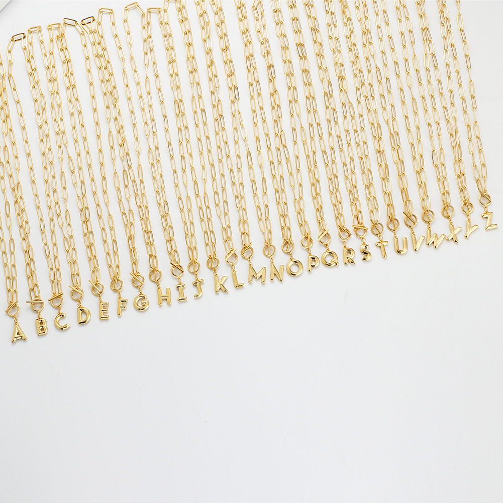 Wholesale of new OT button-and-wear copper English letter real gold plated sweater chain accessories for both men and women 3