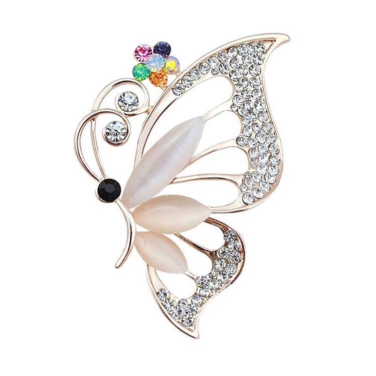 Flying butterfly cat eye brooch