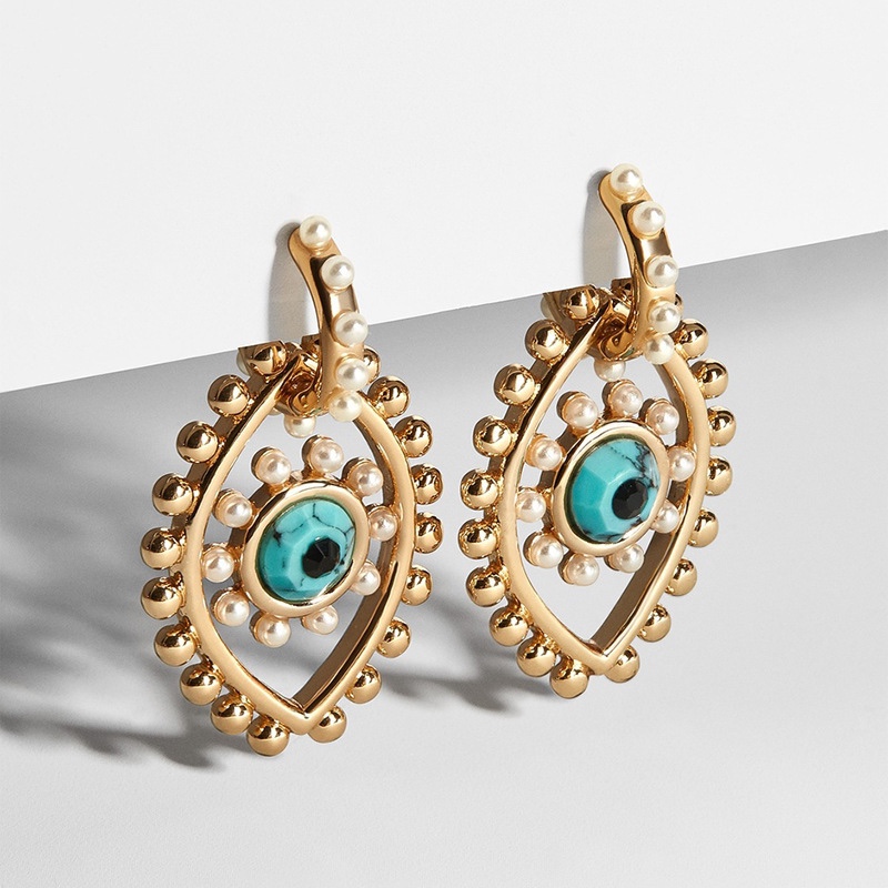 Vintage eye earrings, European and American trends, chic styling.