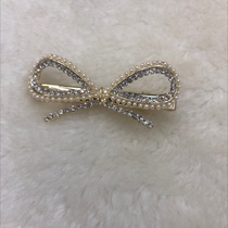 Bow tie bobby pin