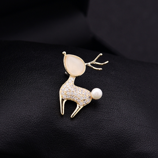 An opal deer brooch