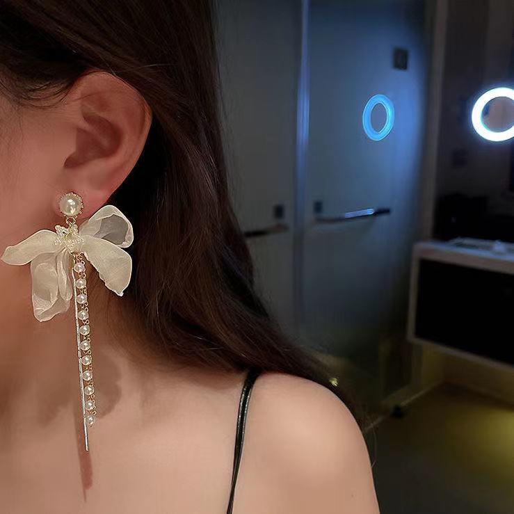 Pearl bow earrings 2021 new fashion women's earrings temperament high-grade luxe drop fringe earrings net red