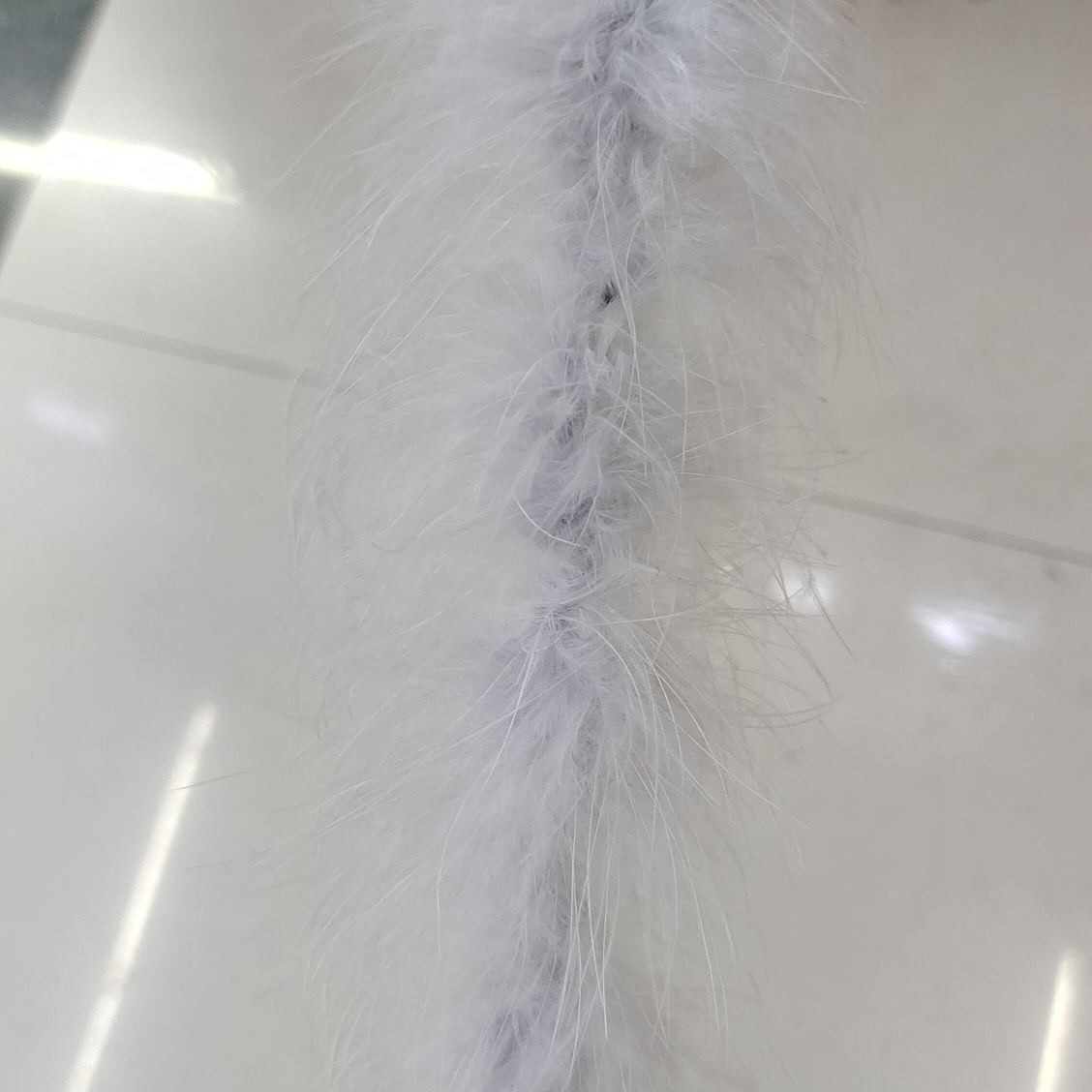Turkey feather strips two meters one gray