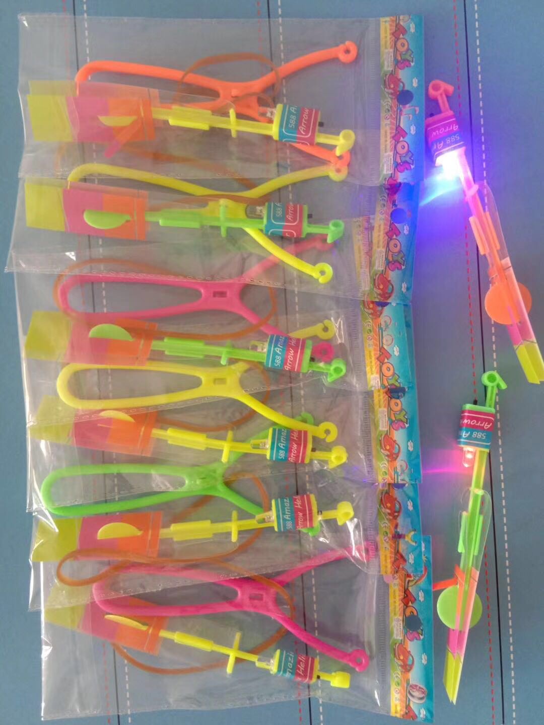 Luminous flying arrow, luminous slingshot, cloud Piercing Arrow, children's slingshot flying saucer, flashing toys, and popular toys at the luminous night market Application Scenario
