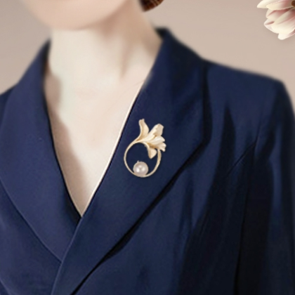 Gold trumpet pin