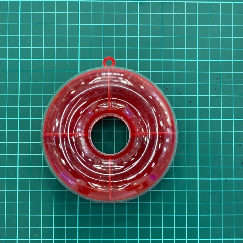 Doughnuts on a red bottom in a box