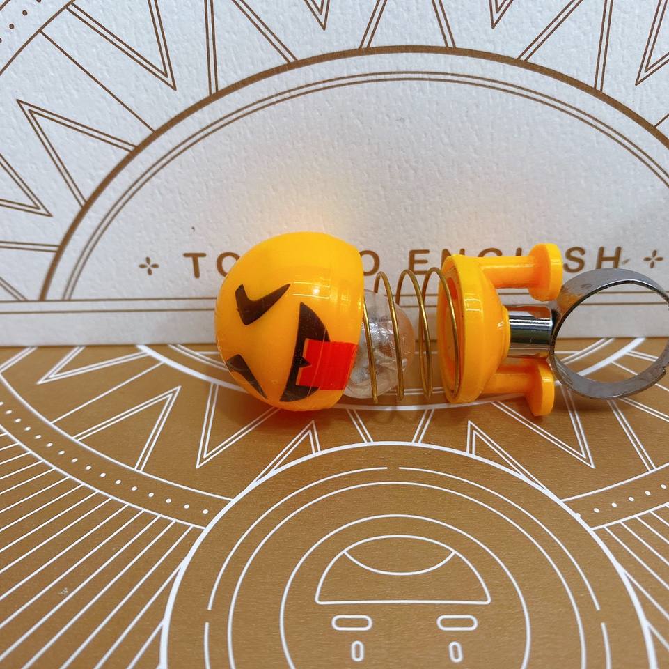Orange Minion flash fashion trend Korean children's smiley ring