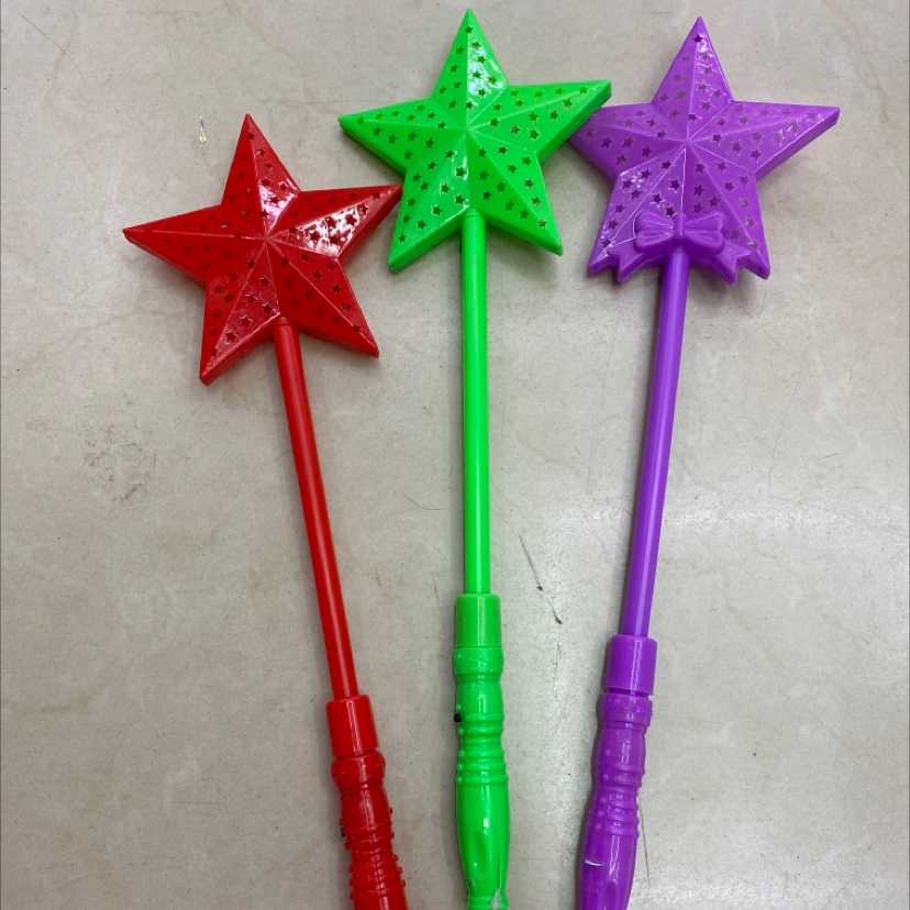 The five-pointed star flash stick is purple, green and bright red details Picture