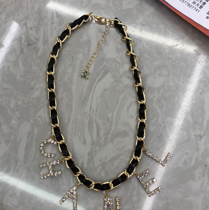 Leather cord and letter necklace