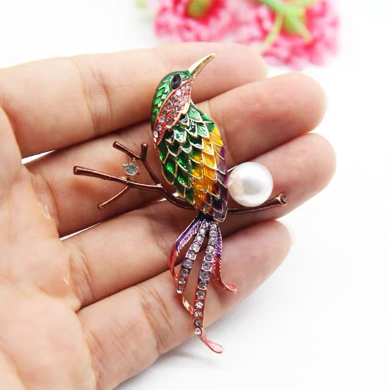 Painted woodpecker brooch