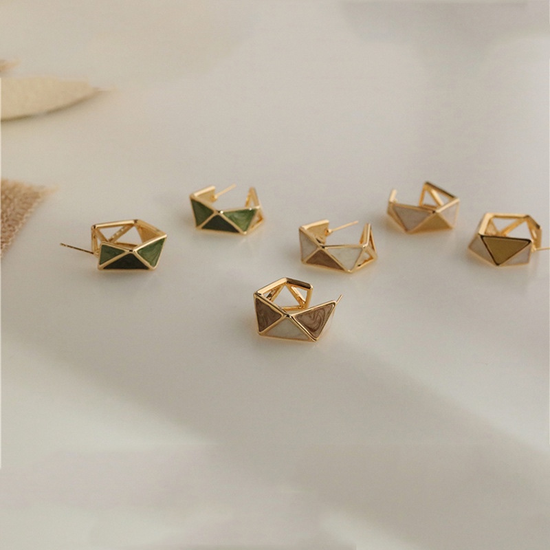 Geometric faceted drop earrings, exquisite texture.