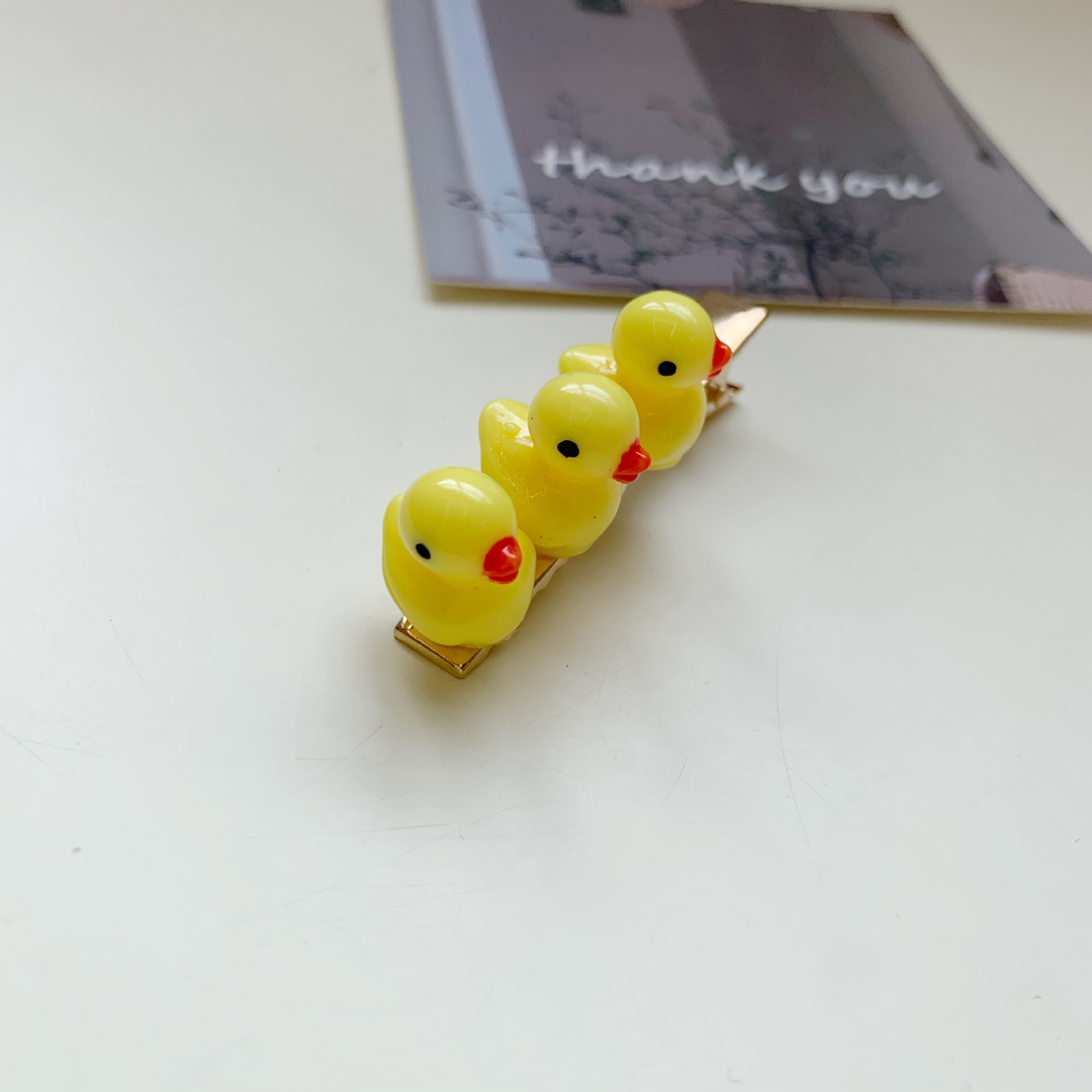 شباك منقار البطة الصفراء الصغيرة في مؤخرة الرأس Item Picture