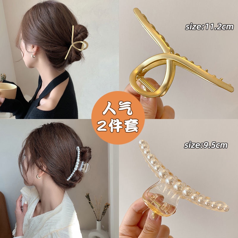 A Korean girl with a simple, elegant and stylish large metal clip, a hair clip at the back of her head, and a headpiece b