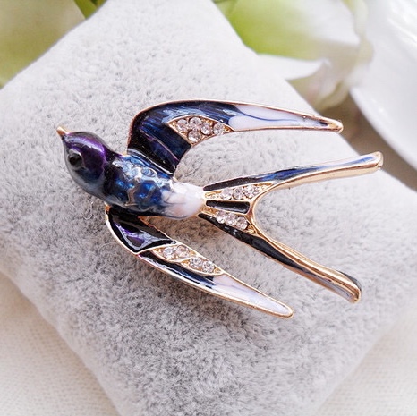 Purple swallow brooch