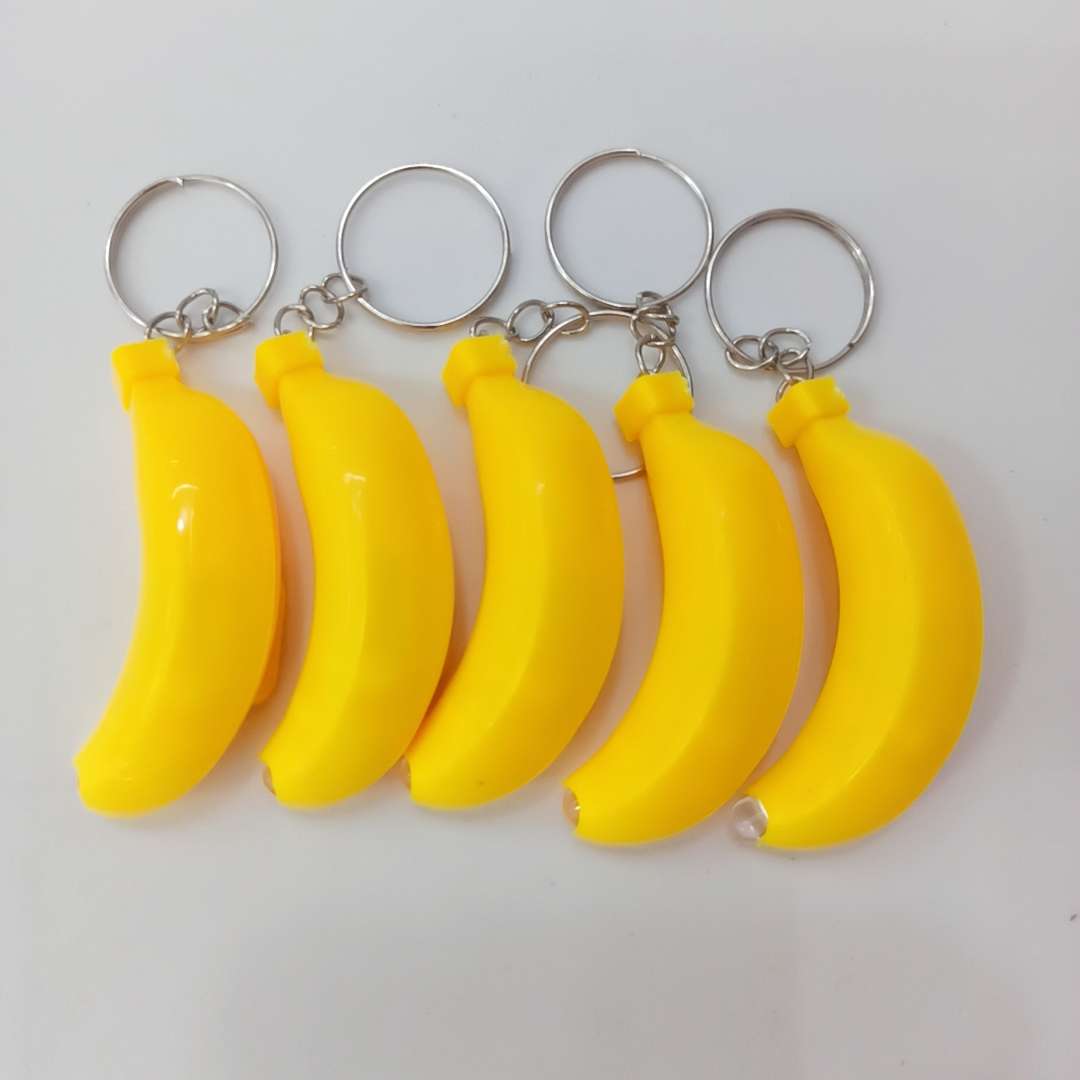 Keychain light white banana small gift event: Factory direct sales of luminous toys, keychain light, tall electronic toys 1 Item Picture