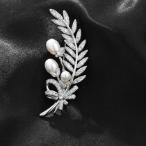 Pearl white feather brooch
