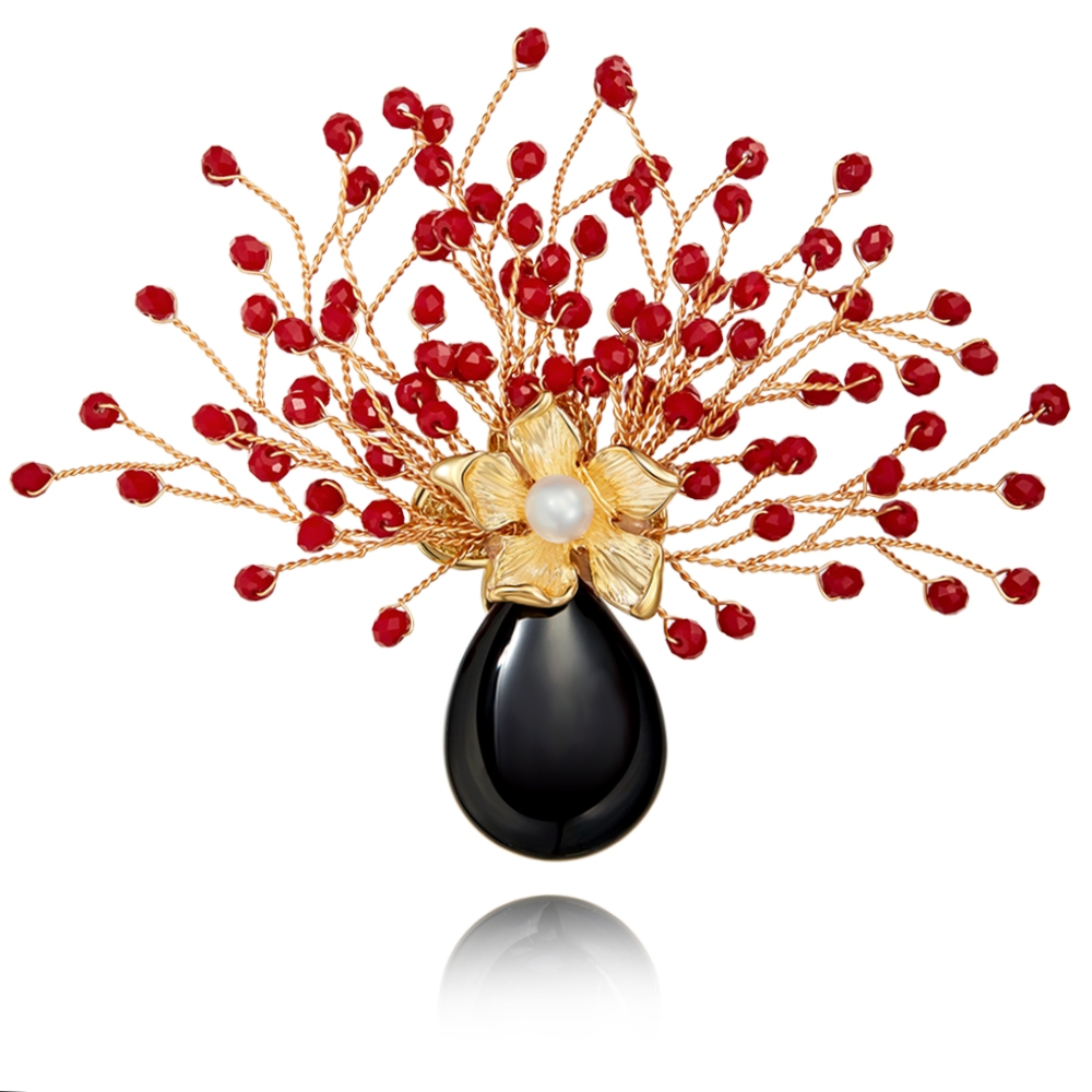 The red cherry blossom brooch