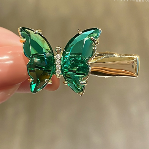 Green butterfly duck clip