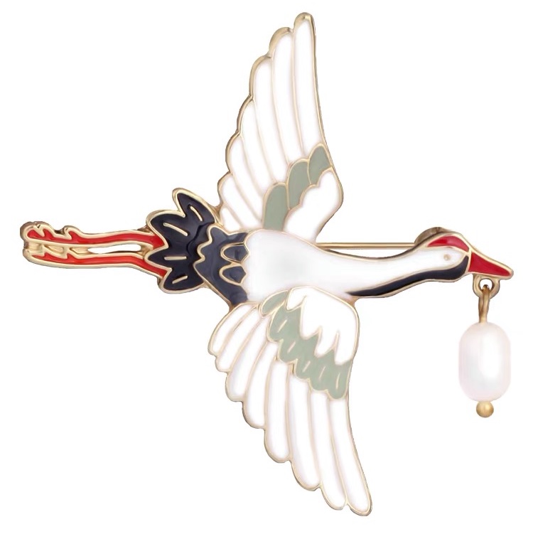 Yellow crane brooch
