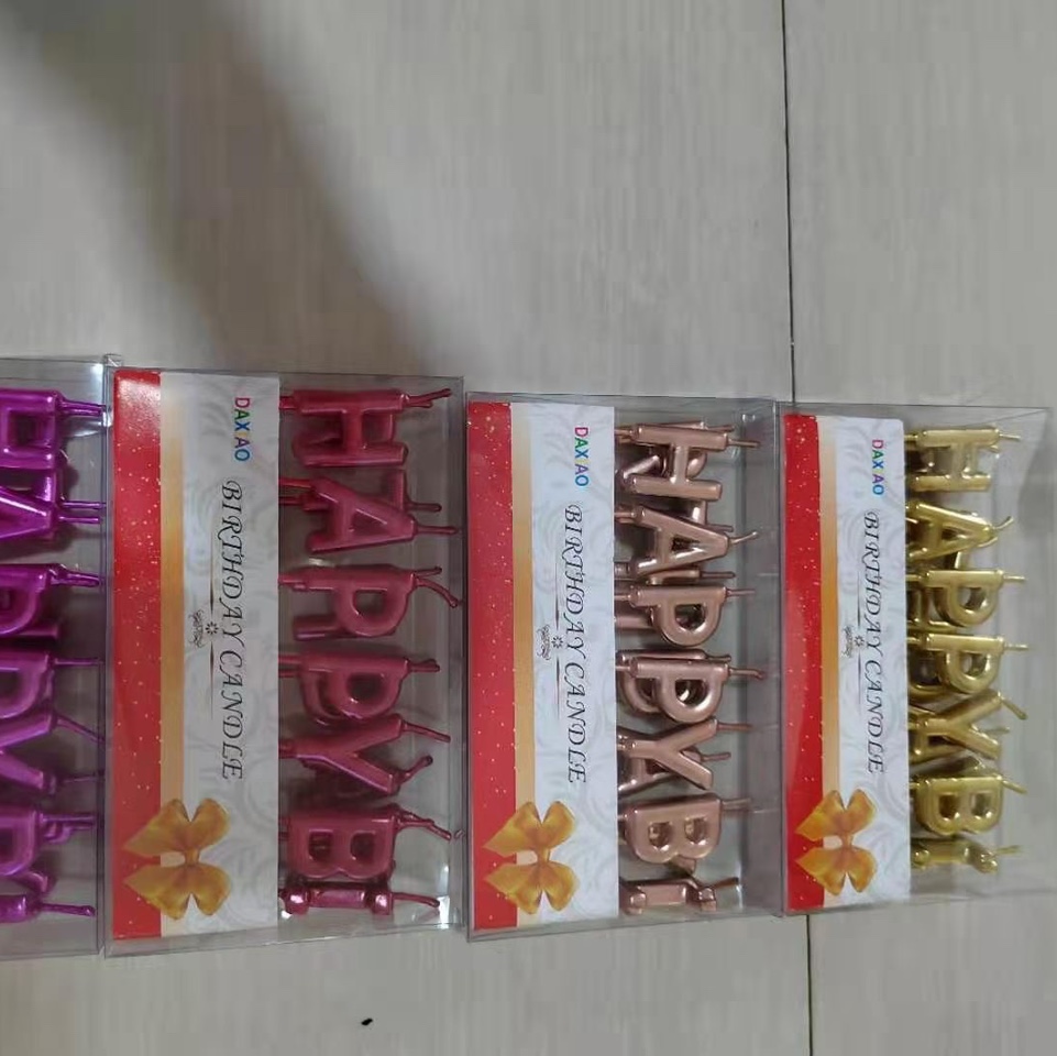 The birthday candles are gilded