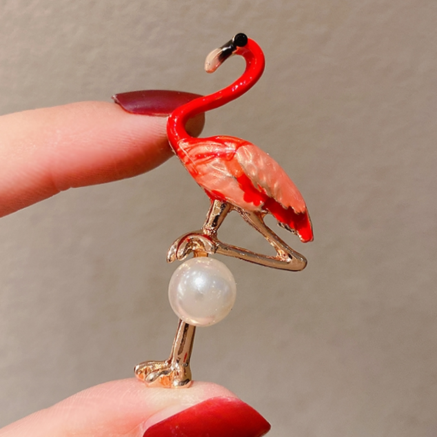 A red Turkey brooch