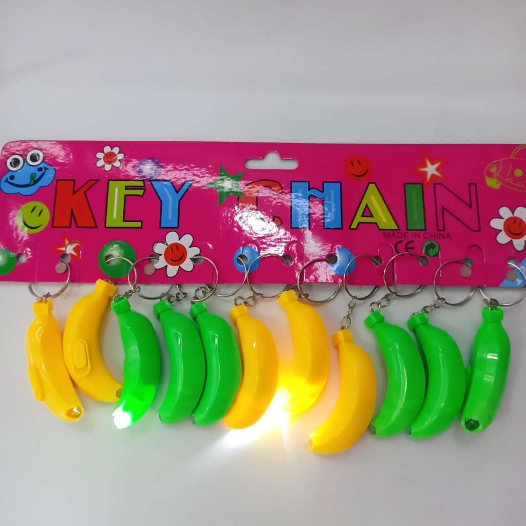 Keychain light white banana small gift event: Factory direct sales of luminous toys, keychain light, tall electronic toys 1 details Picture