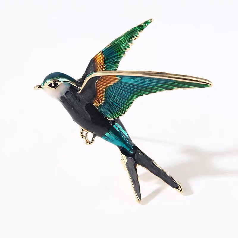 Colourful swallow brooch