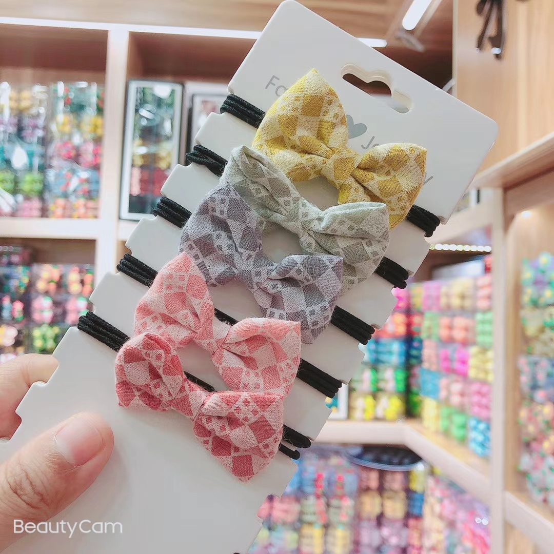 Korean version new leather band bestseller, four-leaf clover hair tie, alloy hair accessory, hair band for women, Mifel 004 Application Scenario