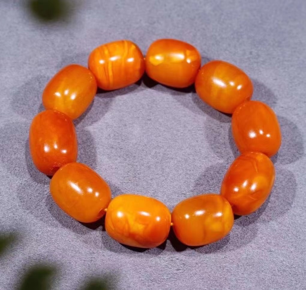 Old amber barrel beads detail image 1