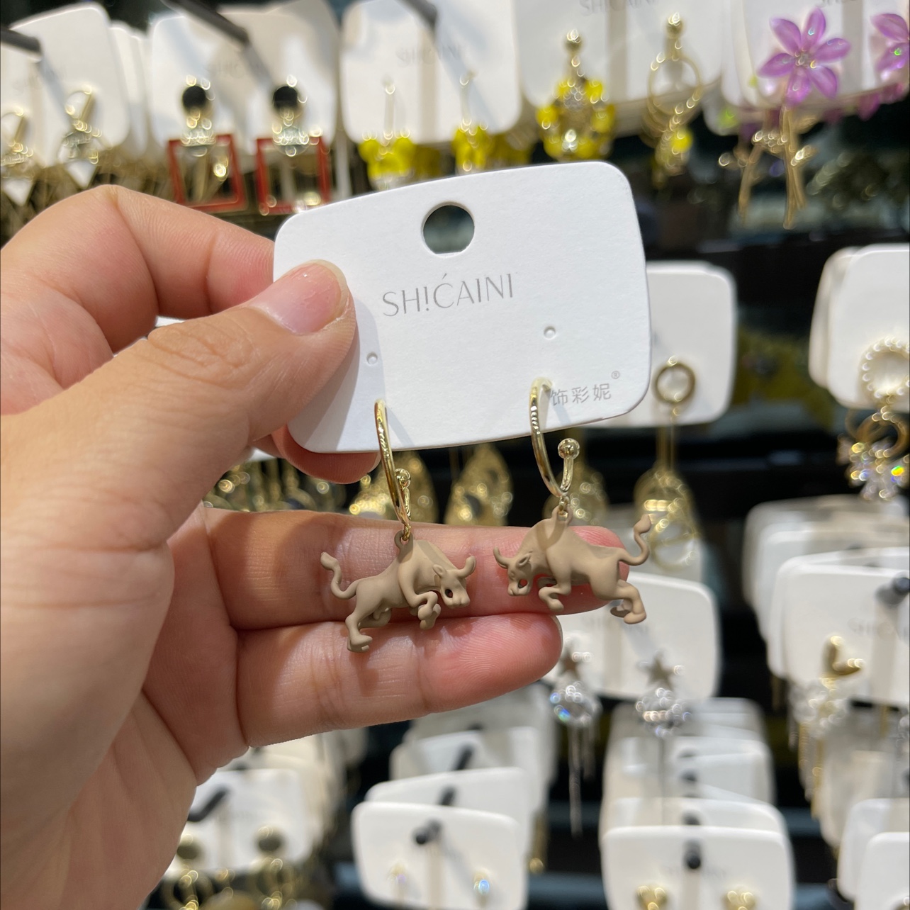 Spray painted individual bull ear rings