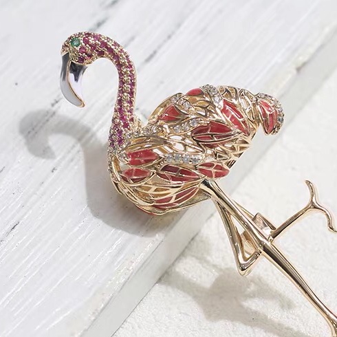 Painted crane brooch