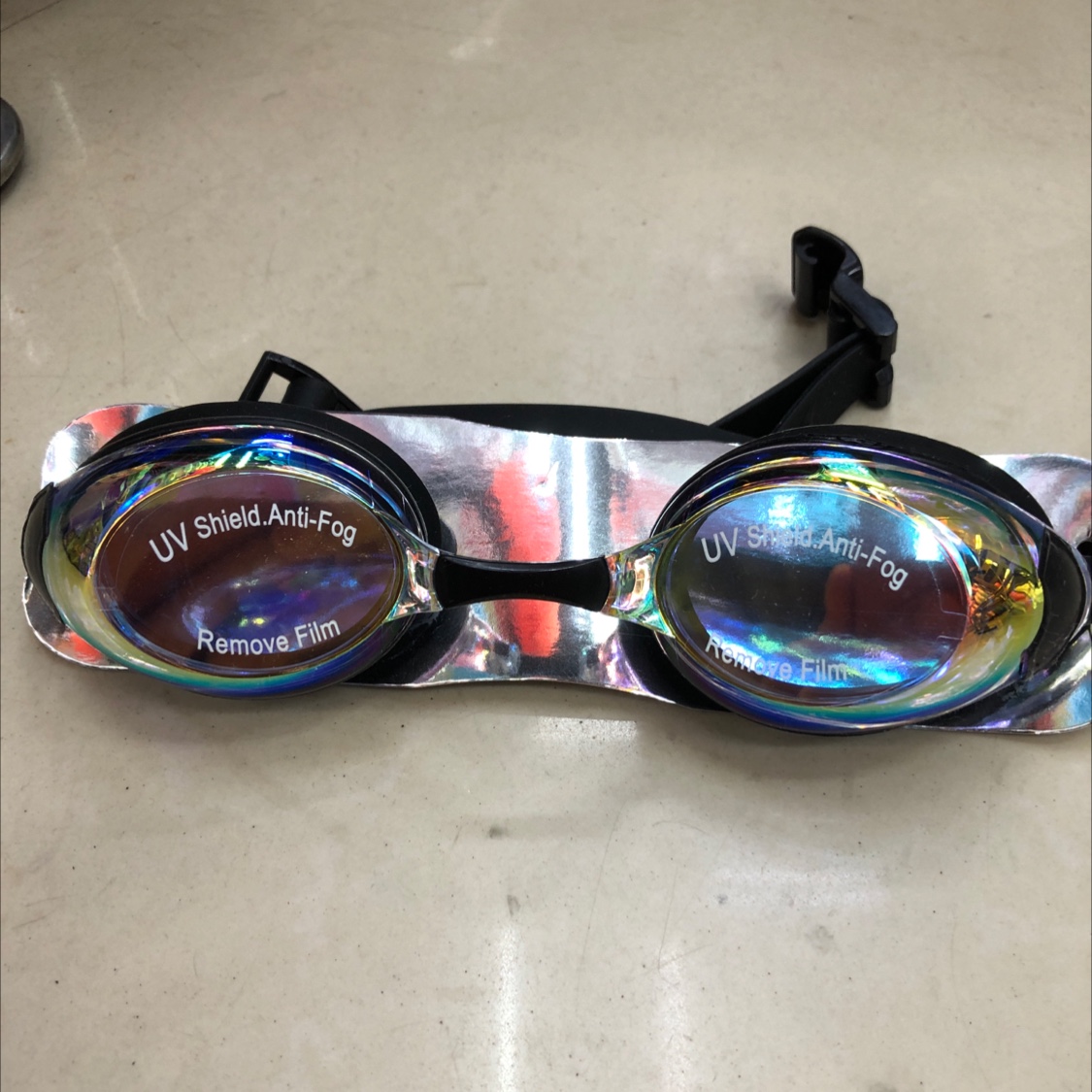 Black swimming goggles
