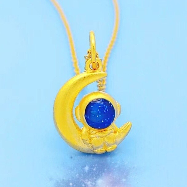 Moon astronaut pendant
