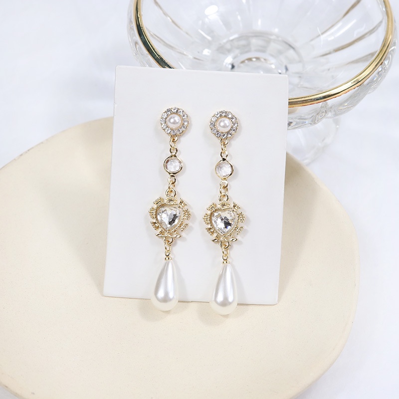 Baroque drop earrings, vintage charm.