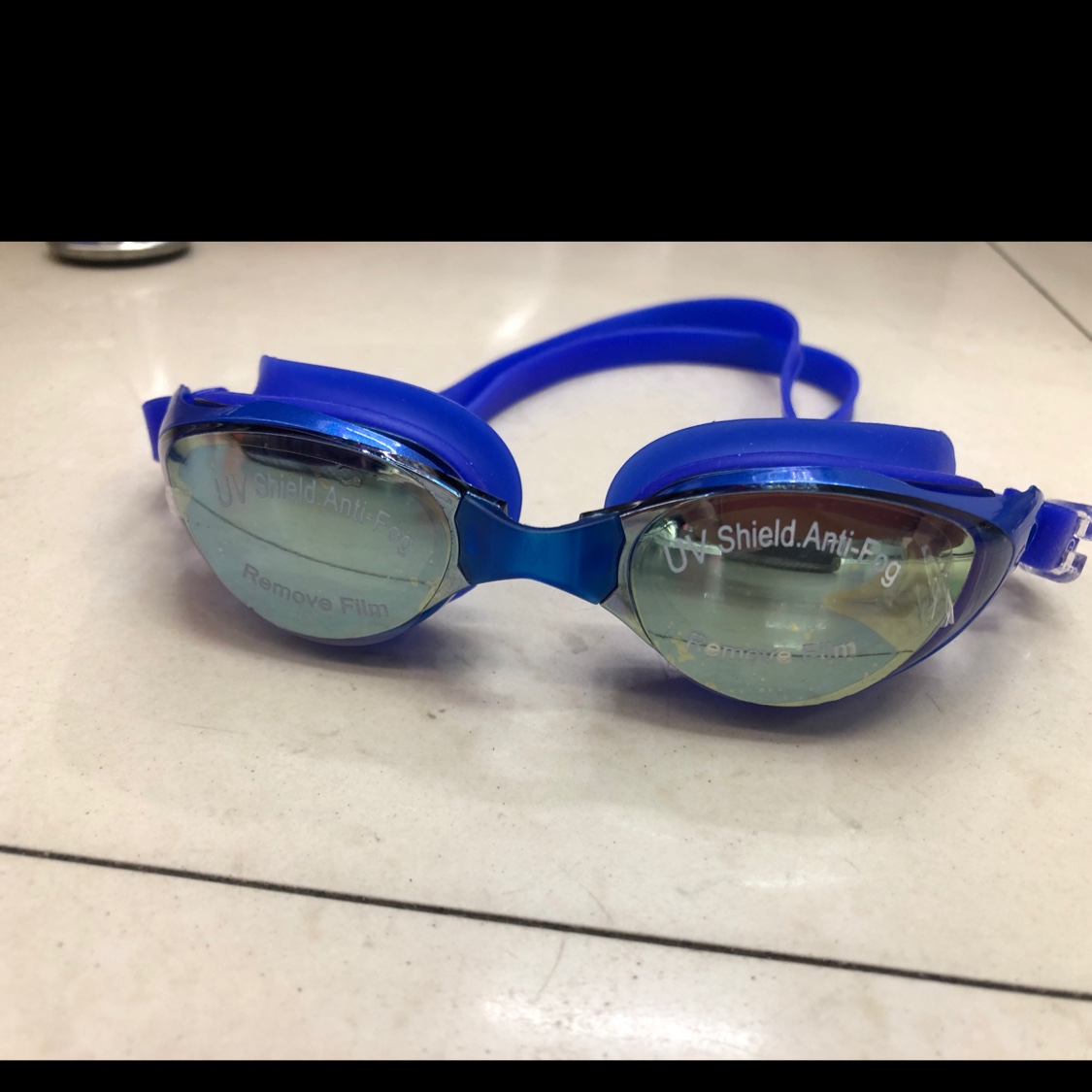 Electroplated blue swimming goggles
