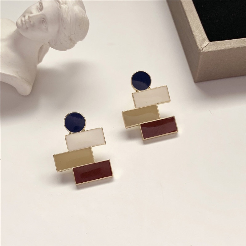 Geometric drip earrings, unique shape, full of design.