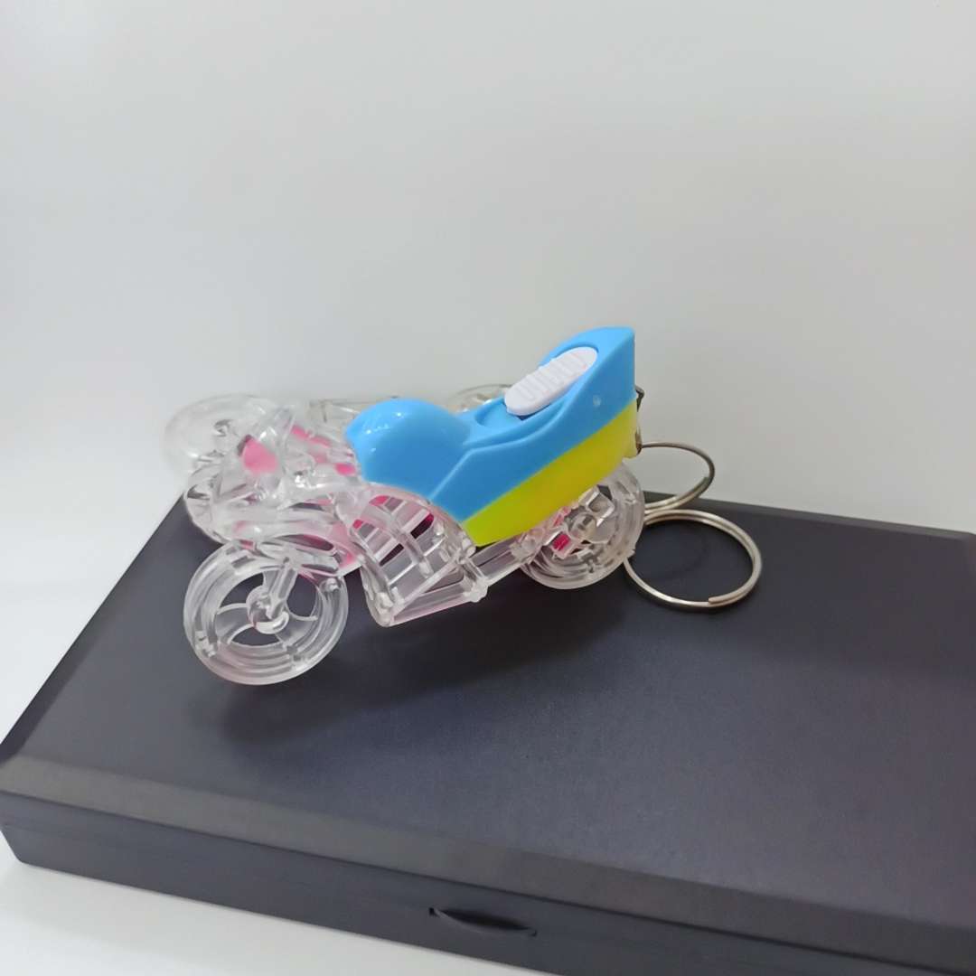 Keychain light, flashing motorcycle, small gift event, factory direct sales small gifts, luminous toys, high-height electronic toys 1 Application Scenario