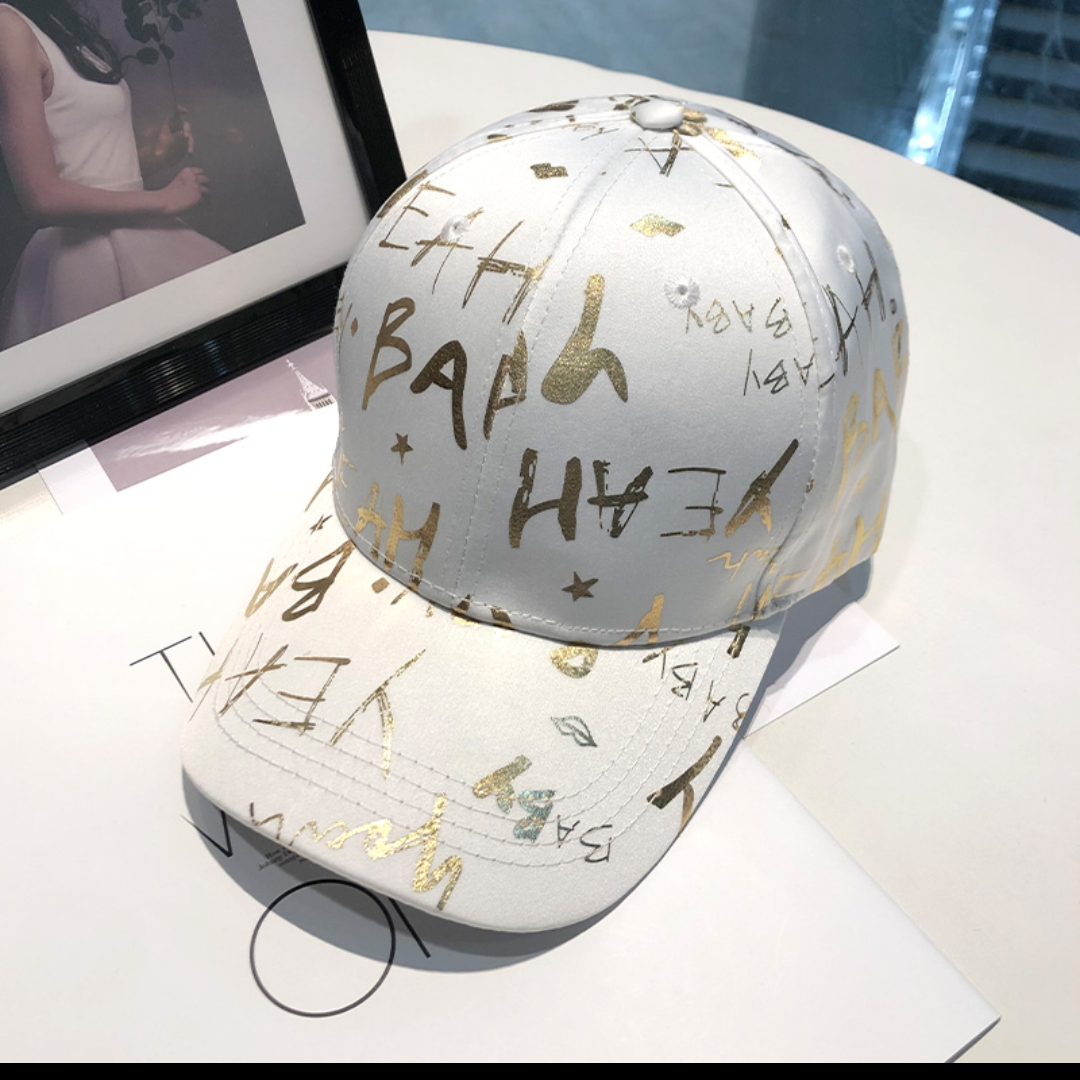 Instagram influencer's new graffiti letter cap children's fashion brand Korean version of a niche shade baseball cap female summer