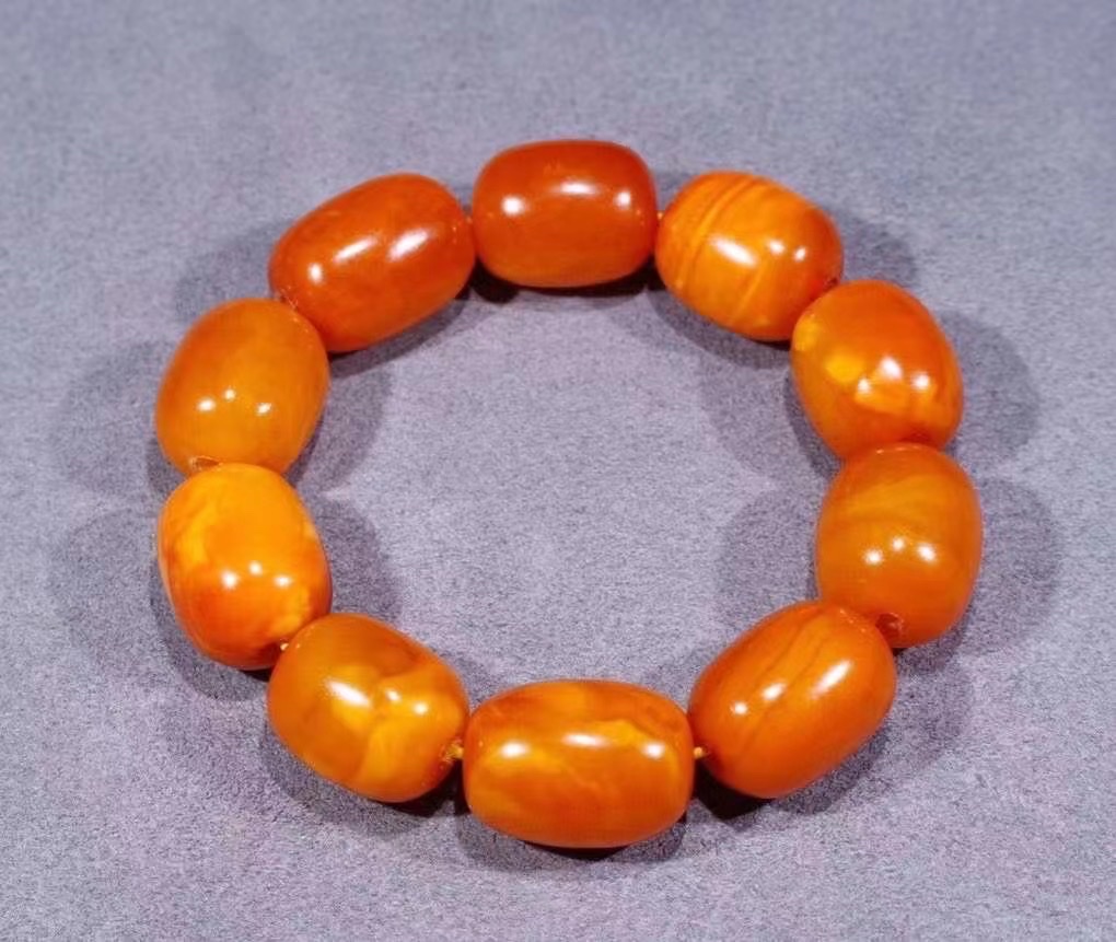 Old amber barrel beads detail image 2