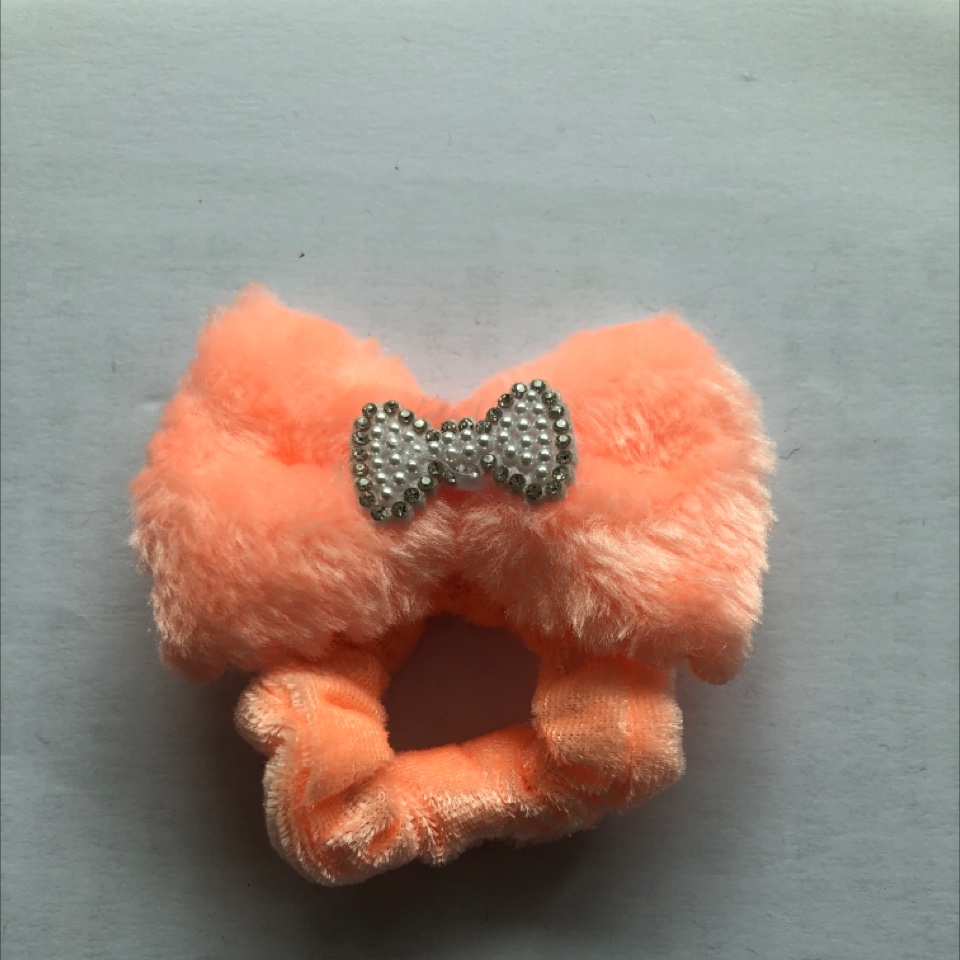 A fluffy pearl scarf and hair band