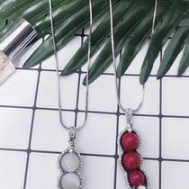 Sweater chain 2 red pearls