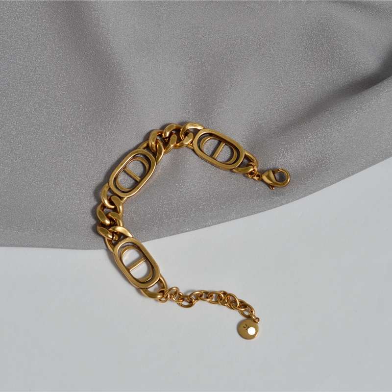 A three-piece set of chain letter necklace, bracelet and ring, with a high-end, retro and aged metal style. It's a trendy collarbone chain Specification image