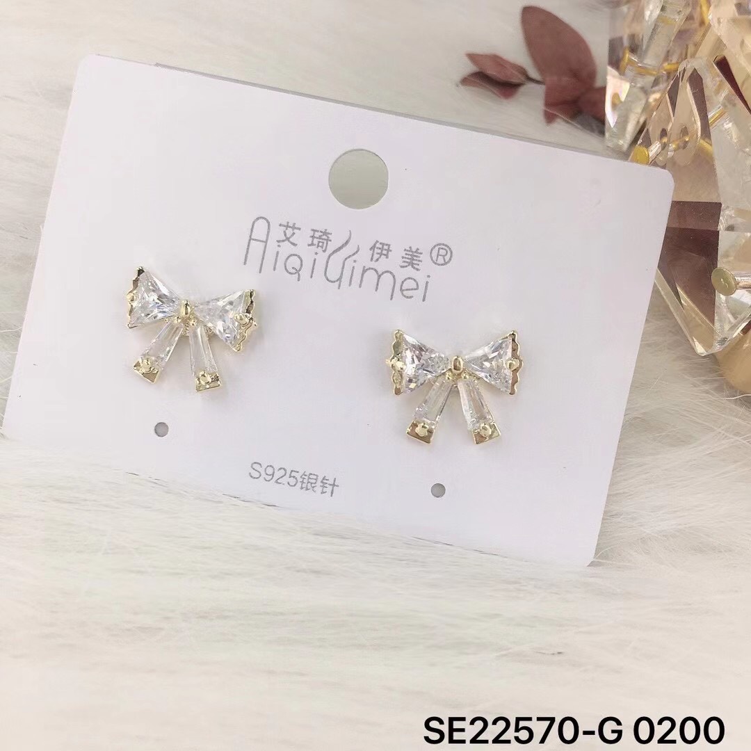 Temperamento bowtie earrs